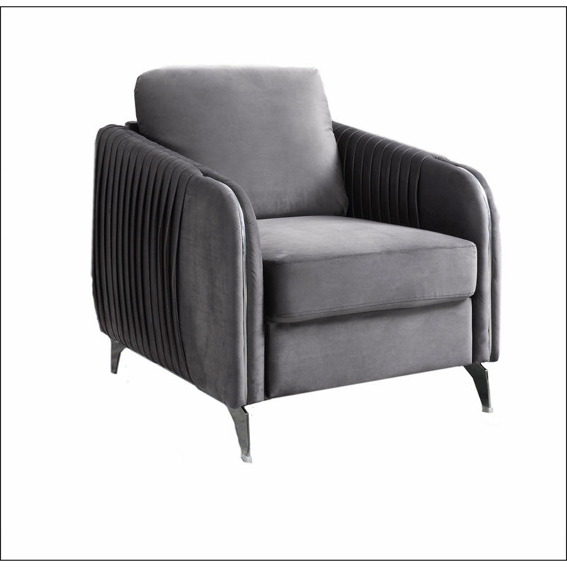 Fauteuil gris en velours à 4 pieds