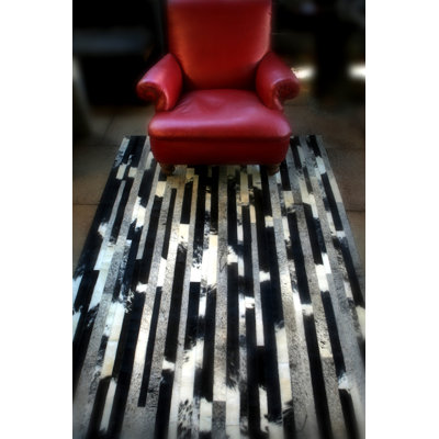 Cojonudo Cowhide Abstract Area Rug