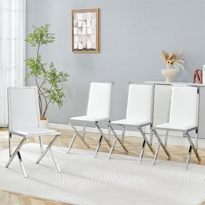 Classic white PU upholstered side chairs, set of 4, silver metal legs, ergonomic seating for dining room modern style