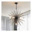 Lustre Sputnik moderne à 7 lumières en métal noir, style étoile, avec chaîne réglable, idéal pour salle à manger ou chambre.