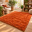 Tapis à poils longs orange brûlé de 152 x 213 cm avec envers antidérapant