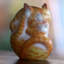 Flexible Cat In Orange Wood Sculpture