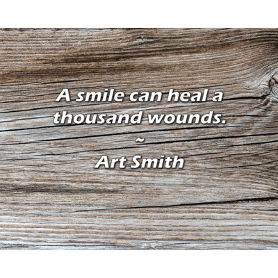 Art Smith Quote: A smile can heal a thousand wounds.