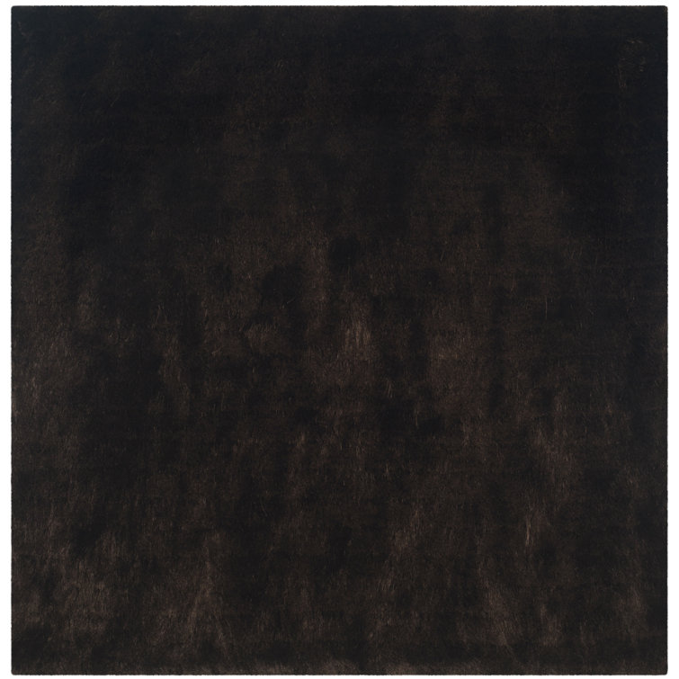 Delane Handmade Tufted Chocolate Area Rug