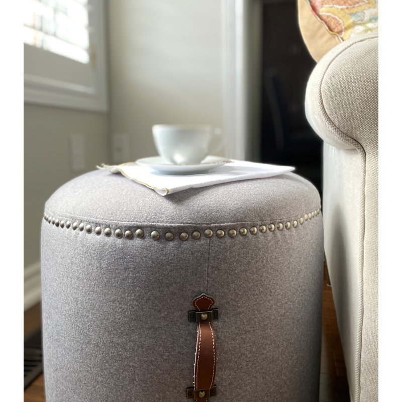 Johnny Fabric Upholstered Round Pouf Ottoman with Faux Leather Handle, Light Gray Polyester