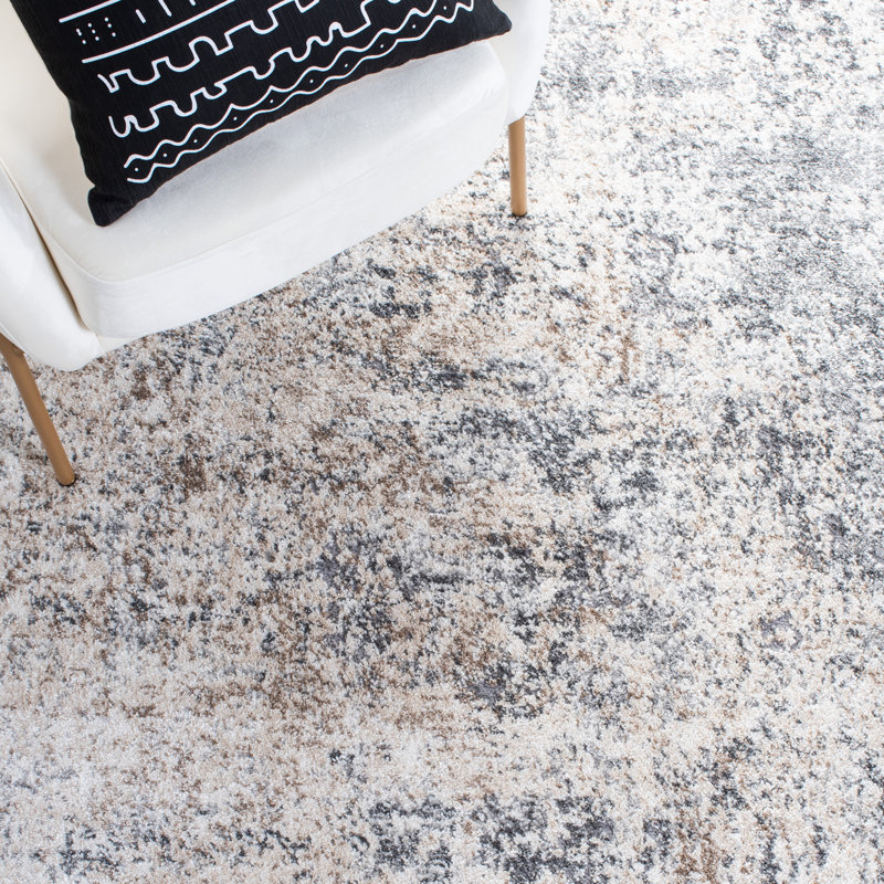 Ivory and Grey Abstract 10' x 14' Stain-Resistant Synthetic Area Rug
