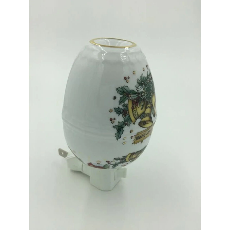 Cloches de Noël Kaamilya sur une veilleuse ovale