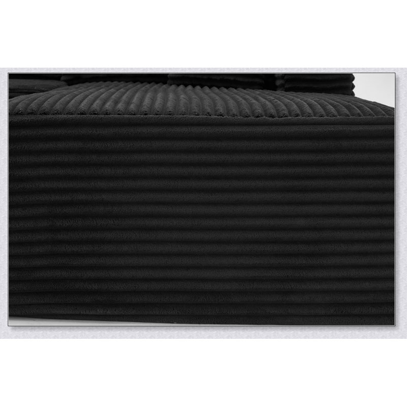 Pouf rembourré ergonomique avec dossier surélevé et poche de rangement latérale intégrée pour une détente optimale.
