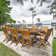 Coster 8 - Person Teak Wood Patio Dining Set with Round Table