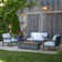 ORTUN 55" Metal Outdoor Loveseat with Cushions by Real Flame