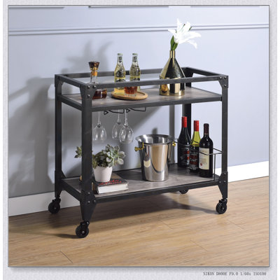 Rustic Oak and Charcoal 2-shelf Serving Cart with Stemware Rack, Wine Storage, and Caster Wheels for Easy Mobility.