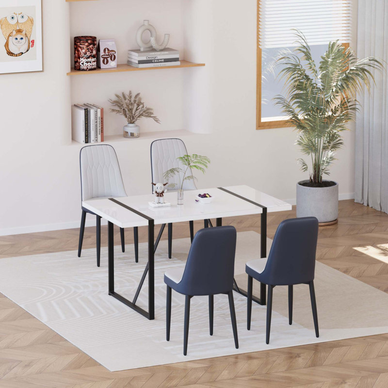 Ensemble de table de salle à manger moderne 55 po pour 4 personnes avec pieds en métal et chaises rembourrées en polyuréthane