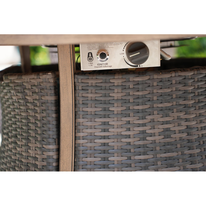 Areefa 4 - Person Wicker Patio Dining Set with Round Table , Cushions Included
