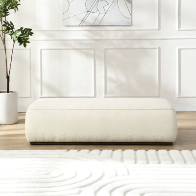 Confortable repose-pieds beige granuleux de 52 pouces au look distinctif du tissu texturé, polyvalent comme siège ou siège relaxant, confortable et solide pour la décoration intérieure en pouces, design, fonction, siège, construction