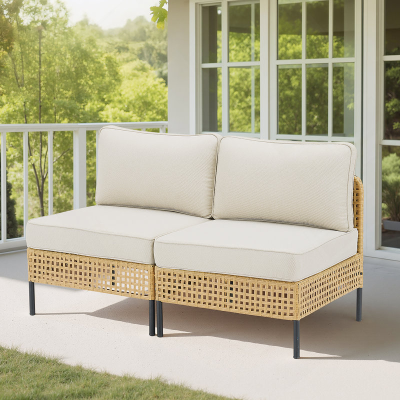 Ensemble de canapé modulaire d'extérieur en osier avec coussins beiges pour des sièges durables et élégants