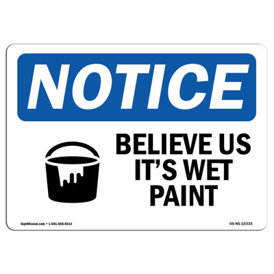 Panneau «Believe Us It's Wet Paint»