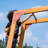 Dolphin Playground Luxury Cedar Playground Set: Double Wave Slide, 2-in-1 Table, Monkey Bars, Balance Beam, 3 Swings, Large Rock Wall, Wood Roof