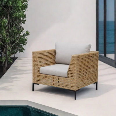 Fauteuil d'extérieur imperméable de style rotin