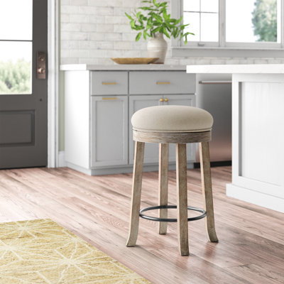 Jameece Swivel Upholstered Counter Stool with Solid Wood Frame