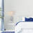 Flossie 24.75"H Blue and White Metal and Tan Rattan Table Lamp