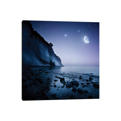 Rising Moon Over Ocean And Mountains Against Starry Sky by Evgeny Kuklev - Wrapped Canvas Print