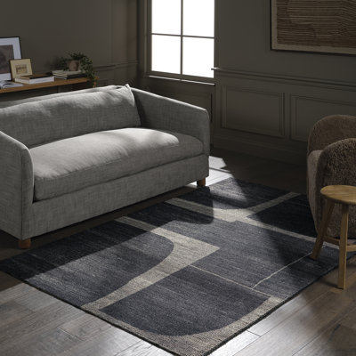 Handwoven Abstract Black Area Rug Made with Sustainable Materials