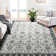 Dejaun Machine Woven Polyester Oriental Blue Area Rug