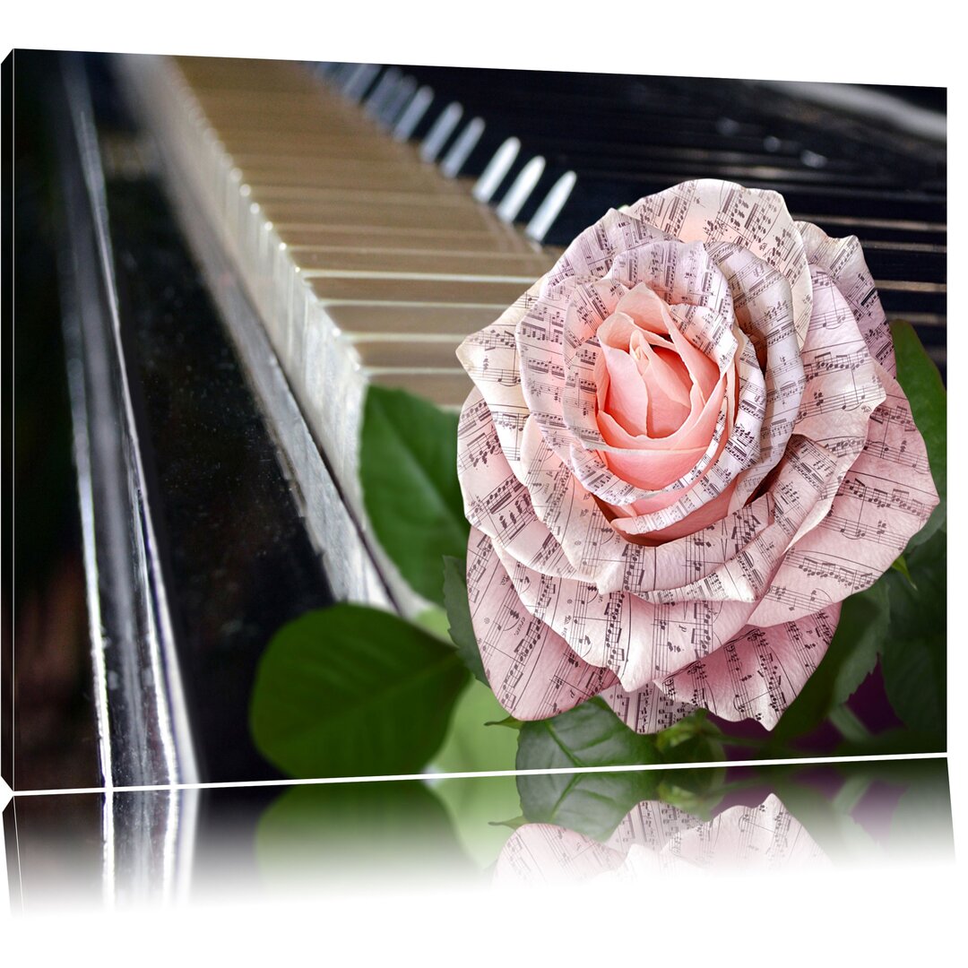 Leinwandbild ,,Noten auf zarter Rose neben Klavier", Fotodruck