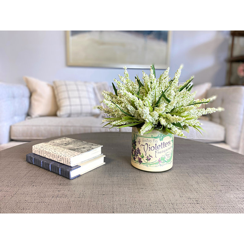 Heather And Lemon Leaves In A Glass Labeled Pot