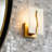 1-Light Armed Wall Sconce Gold Accent with White Faux Marble Pattern
