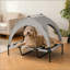 Lit surélevé pour animaux avec conception surélevée pour un confort et une circulation d'air améliorés, idéal pour toutes les races et tailles.