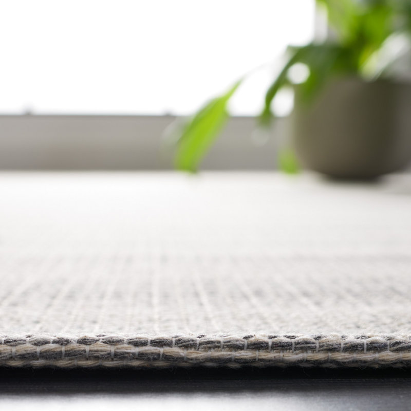 Augustine Ivory/Dark Grey Synthetic Boho-Mod 4'x6' Area Rug