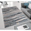 Tapis tissé à rayures abstraites