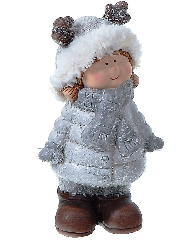 Résine debout dans un manteau d'hiver