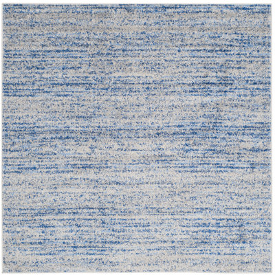Tapis gris à motif abstrait Riebe