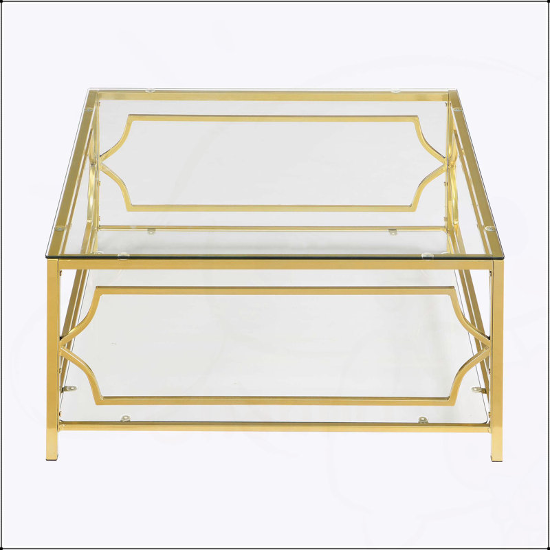 Table basse carrée en verre avec cadre luxueux en métal géométrique, finition dorée et tablette inférieure pour des espaces de vie élégants