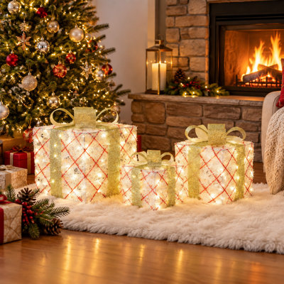 Coffret-cadeau de Noël 3 pièces pré-illuminé en guirlande argentée avec des nœuds dorés