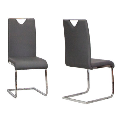 Doral White Faux Leather Dining Chairs w Chrome Cantilever Base Set of 2 by Orren Ellis
