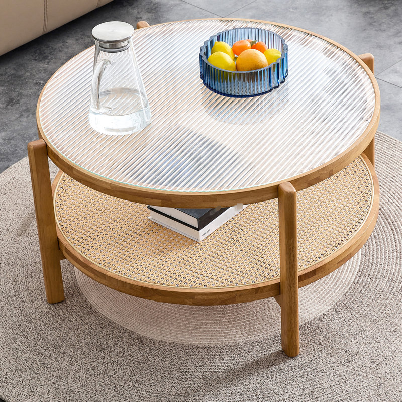 Table à thé simple en bois massif avec couche inférieure tissée et côté rond moderne en verre transparent
