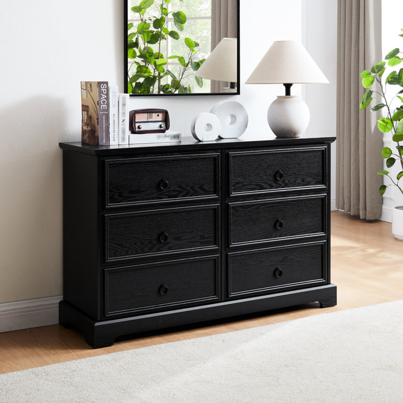 Commode noire pour chambre à coucher avec rangement élégant et poignées élégantes