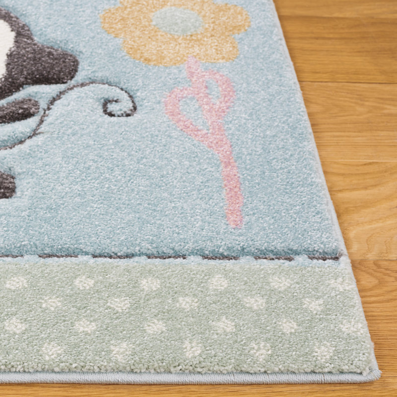 Tapis bleu en polypropylène tissé à la machine Featherste, Rectangle 5 pi 3 po x 7 pi 6 po