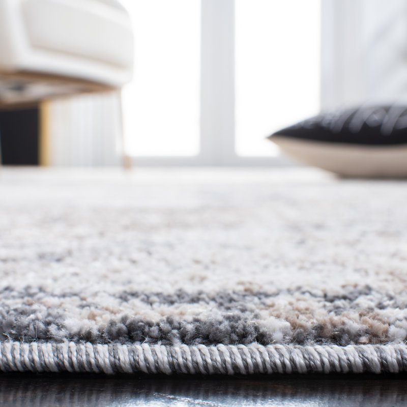 Ivory and Grey Abstract 10' x 14' Stain-Resistant Synthetic Area Rug