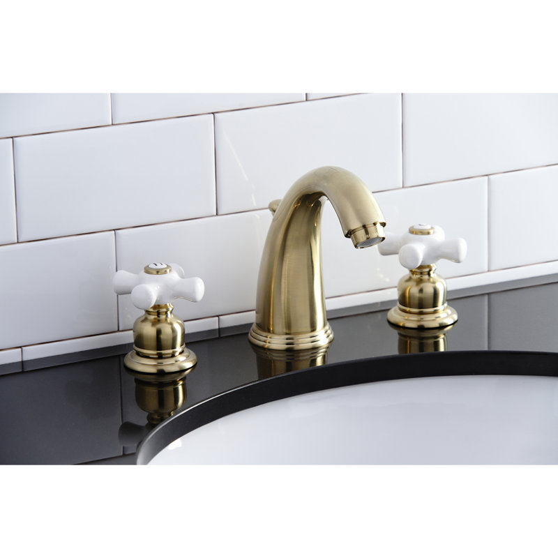 Kingston Brass Victorian Two-Handle 3-Hole Deck Mount Widespread Bathroom Faucet with Retail Pop-Up Drain, Satin Brass