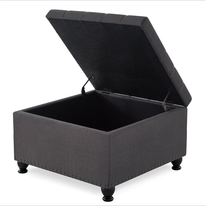 Grand repose-pieds de rangement carré avec pieds en bois, table basse capitonnée avec garniture cloutée pour l'espace de vie