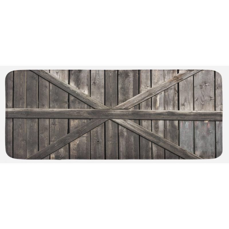 Vieux tapis de cuisine taupe