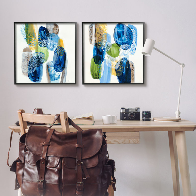 «Round Abstract Pebbled Shapes Layered Blue Tones» par Liz Jardine - ensemble de 2 peintures sur cadre flottant