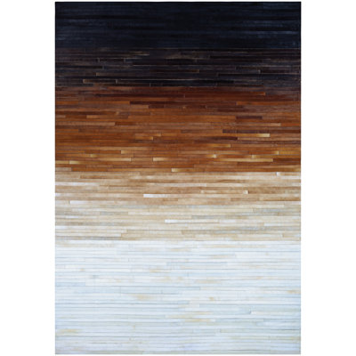 Tapis en laine de vache Ashlie