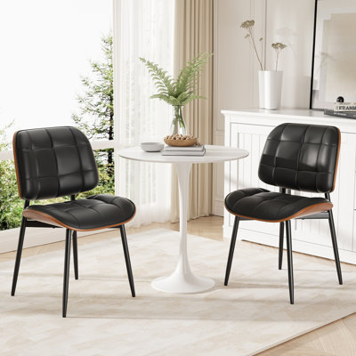PU Leather Upholstered Dining Chairs With Stitched Detailing And Soft Padding - Perfect Side Chairs For Dining Rooms, Kitchens, And Living Rooms. by Corrigan Studio