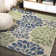 Hagy Modern Floral Textured Weave Navy/Green Indoor/Outdoor Rug
