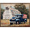 Camion bleu américain avec grange